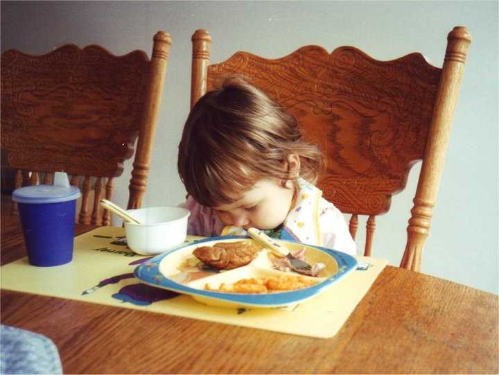 1994_11_Erin.jpg - November 1994 asleep in her food