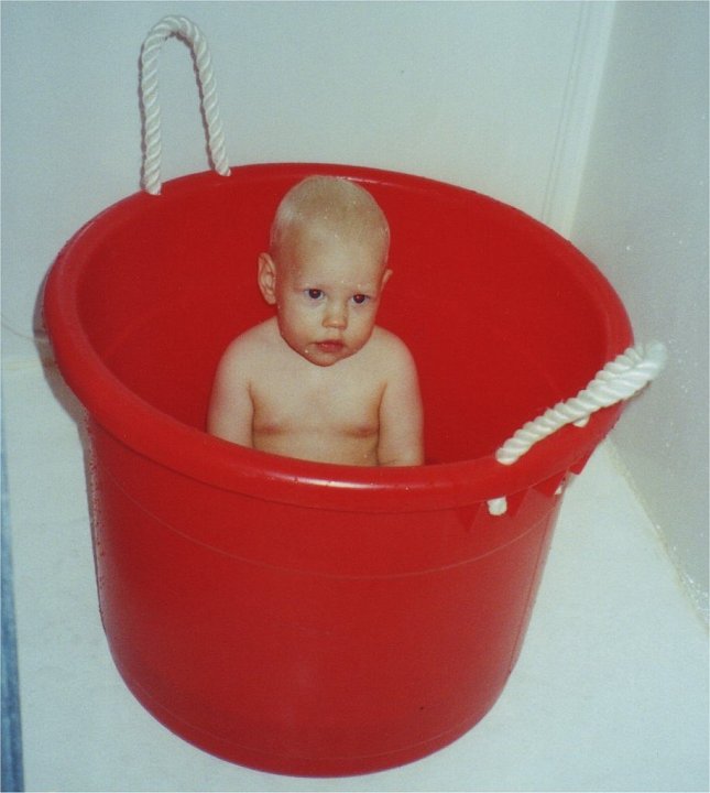 1994_05_27_Steph.jpg - Stephanie's time for a "muck bucket" bath at the Cabin - May 27, 1994