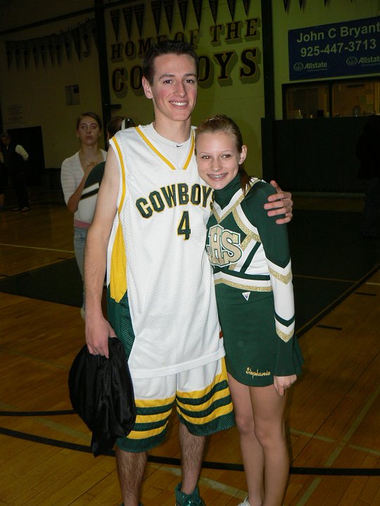 2008_02_15_T&S.jpg - Stephanie gives Travis a hug after his last basketball game. February 15, 2008