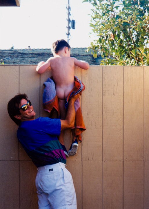 1994_07_27_Thoov.jpg - Travis loved trains - a train passed by the Fremont Swim club & he just had to watch!July 27, 1994